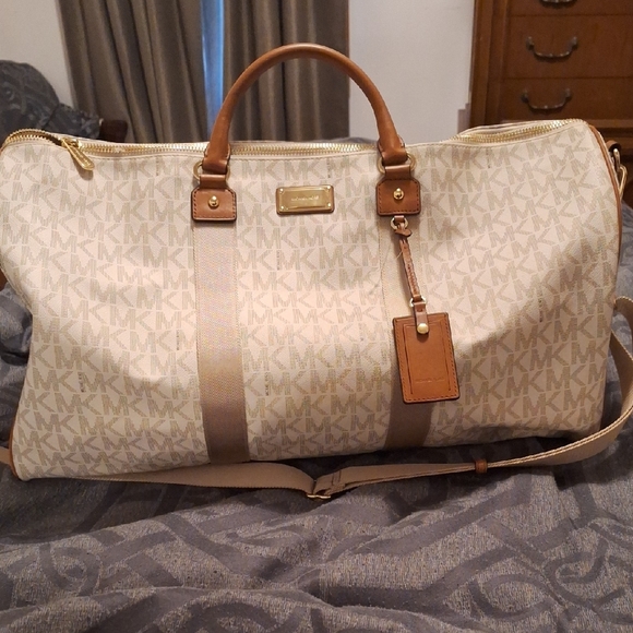 Michael Kors Cream and Tan Duffel Bag with Monogram Pattern - Picture 1 of 10